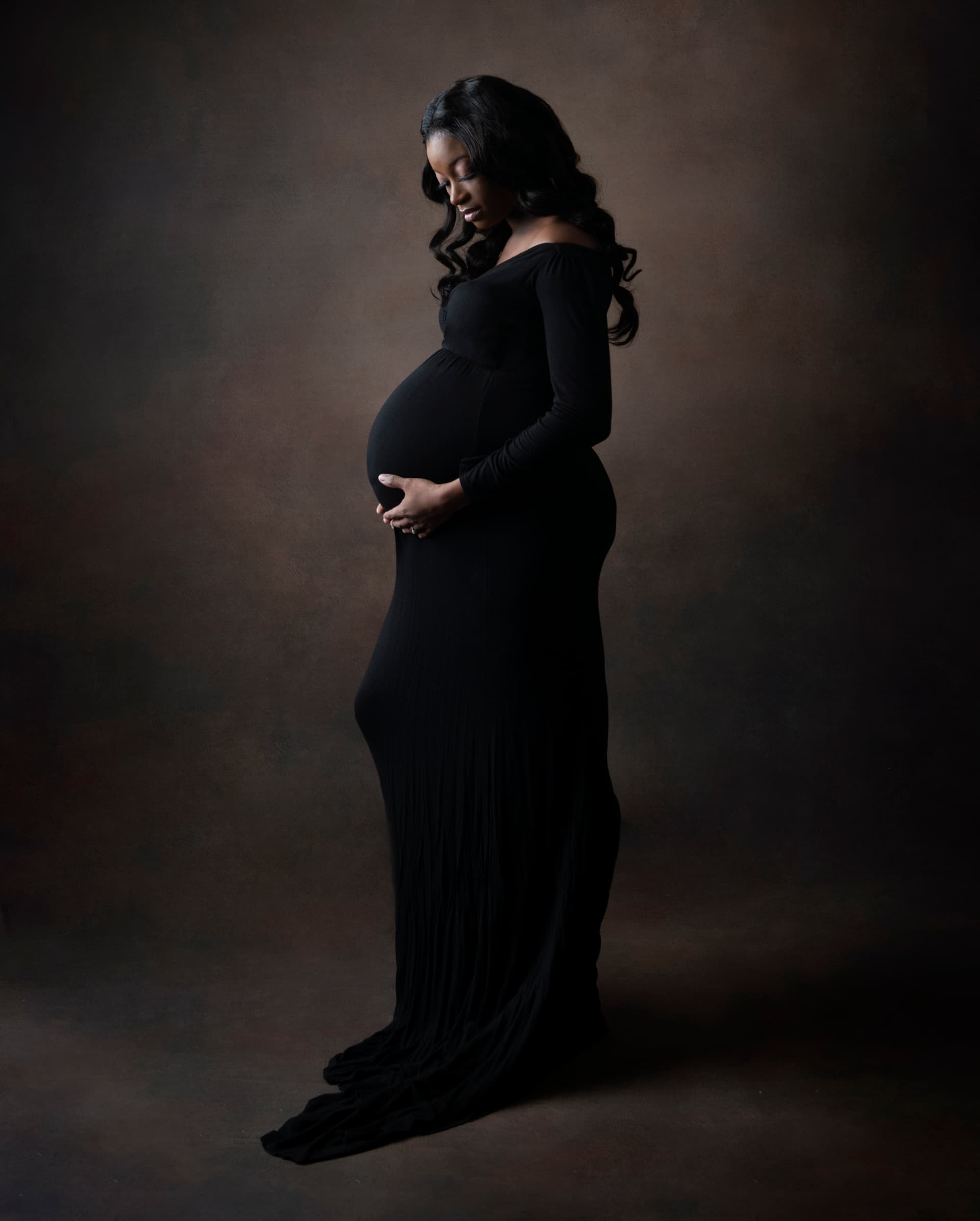 A mother holding her newborn — Hands of Hope